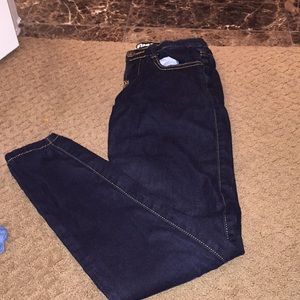 Dark blue jeans by machine